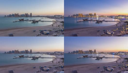 从卡塔拉海滩白天到晚上的时间推移在多哈，卡塔尔，向西湾和城市中心高清在线视频素材下载