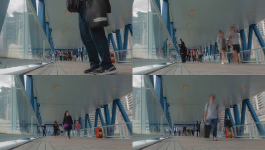 时光流逝:香港中环的天空步道上挤满了游客高清在线视频素材下载