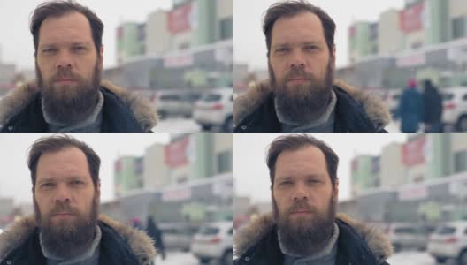 一个冬日里留着胡子的男人的肖像高清在线视频素材下载
