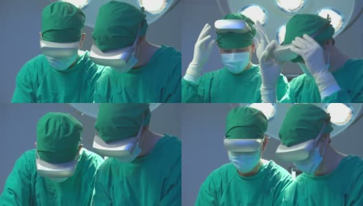 在一家高科技医院的手术室里，一群穿着全套手术服、戴着增强现实耳机的医生正在为病人做手术。医疗技术的概念。高清在线视频素材下载