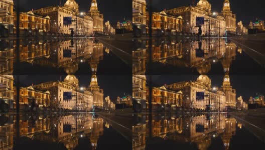下雨天的上海外滩景观4k慢镜头，历史建筑地标与夜间行车灯光的完美呼应。高清在线视频素材下载