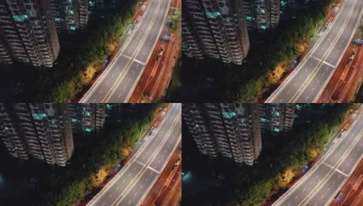 夜景鸟瞰城市居住区外的高架道路交通景观高清在线视频素材下载