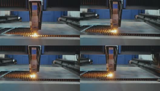 在工业企业里，金属零件是用激光切割机切割的特写镜头高清在线视频素材下载