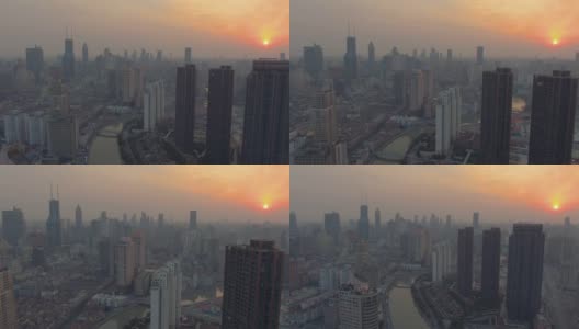 夕阳中的上海。黄埔的城市。中国鸟瞰图。无人机飞行前进高清在线视频素材下载