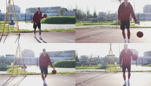 一个男人拿着篮球打起了篮球。慢动作视频高清在线视频素材下载