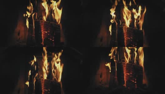 冬天家里壁炉里温暖的炉火。森林在慢慢燃烧。放松舒适的火背景，特写，慢墨高清在线视频素材下载