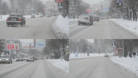 暴风雪中的城市，一辆车。高清在线视频素材下载