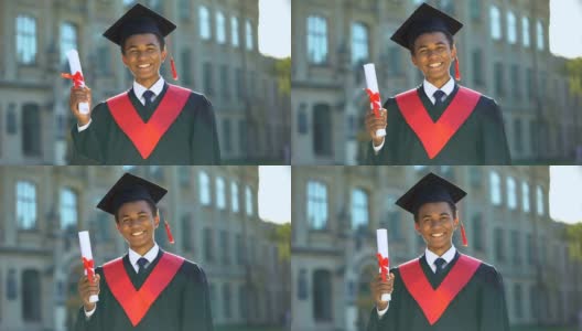 26、快乐的毕业生举着毕业证书，摆着成功的姿态，教育自己高清在线视频素材下载