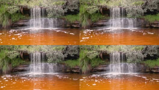 柯林斯海滩瀑布的镜头，曼利，新南威尔士州，澳大利亚高清在线视频素材下载