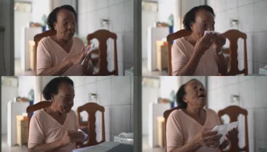 老女人在家里擤鼻涕高清在线视频素材下载