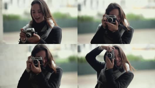 欢快的年轻女子使用照相机高清在线视频素材下载
