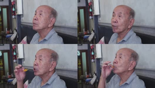 亚洲老人吃食物高清在线视频素材下载