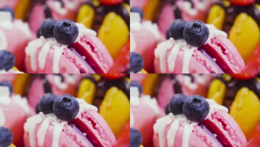 蛋白杏仁饼干。手工制作的美味甜品，新鲜草莓和巧克力装饰的蓝莓甜点高清在线视频素材下载