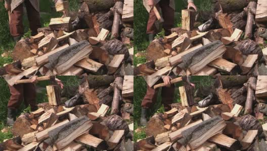 近距离用斧头砍柴堆附近的厚木高清在线视频素材下载