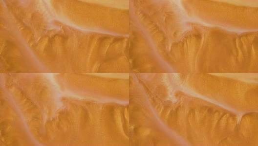 彩色的金色沙子在彩色的液体中有机地移动高清在线视频素材下载