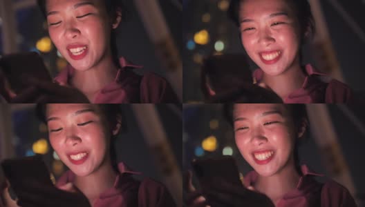 日本女性在晚上使用手机高清在线视频素材下载