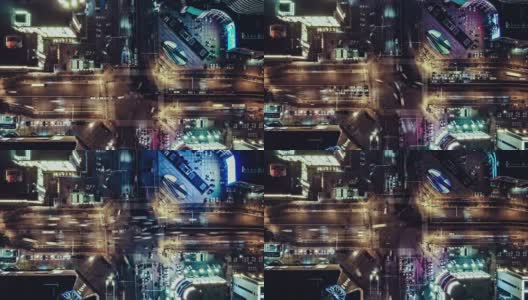 T/L PAN无人机夜间城市街道十字路口的视角高清在线视频素材下载
