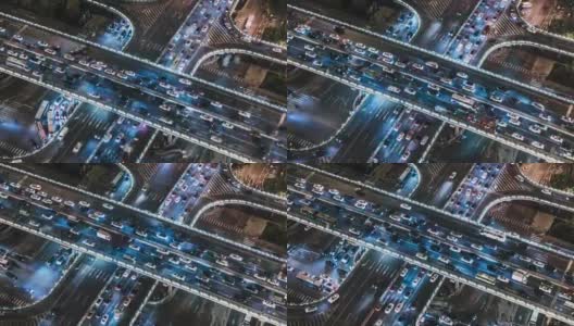 T/L TD无人机视角下的立交桥和城市夜间交通高清在线视频素材下载