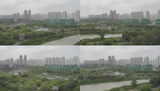 中国香港天水围湿地公园上方的高层公寓高清在线视频素材下载