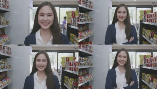 一位亚洲女商人双手交叉站在当地的泰国商店里高清在线视频素材下载