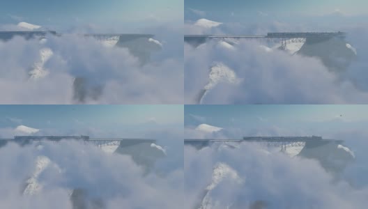 火车在云中与雪和寒冷的天气山上高清在线视频素材下载