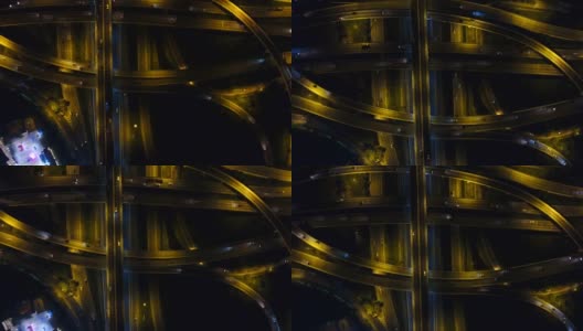曼谷多个堆叠高速公路夜间交通的空中拍摄，航拍视频高清在线视频素材下载