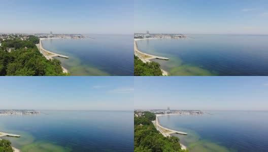 鸟瞰图。飞越波兰格丁尼亚海岸。高清在线视频素材下载