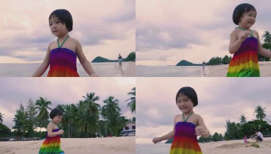 在海滩上跑步的女孩，玩得很开心高清在线视频素材下载
