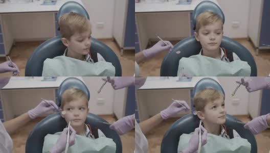 小男孩害怕牙医工具高清在线视频素材下载