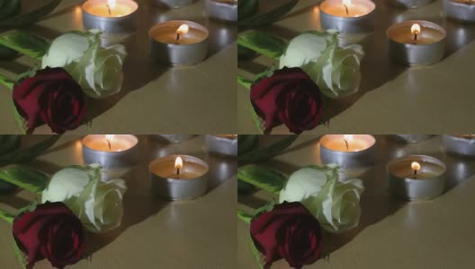 抽象蜡烛灯燃烧和玫瑰花纹理高清在线视频素材下载