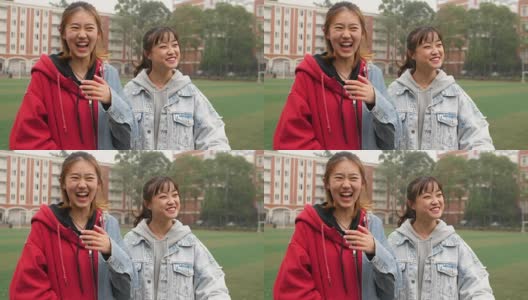 两个快乐的亚洲女孩在校园里聊天高清在线视频素材下载