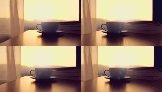 咖啡杯，桌上有书高清在线视频素材下载