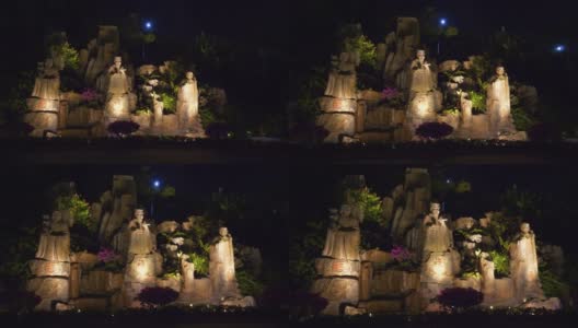 夜晚时间照亮三亚市公园纪念碑喷泉全景4k中国海南高清在线视频素材下载