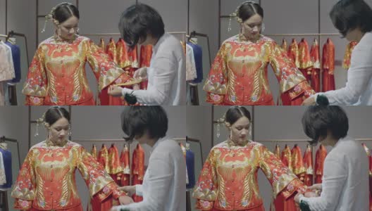 中年中式婚纱设计师拟袖高清在线视频素材下载