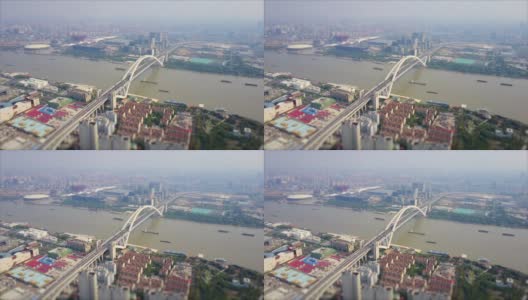 白天上海城市景观交通卢浦大桥滨江航拍全景4k倾斜转移中国高清在线视频素材下载