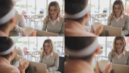 美女在网吧用笔记本电脑高清在线视频素材下载