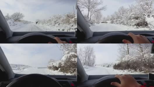 冬季驾驶POV -下雪的乡村道路在冬季驾驶-下雪的乡村道路。手放在方向盘上，从驾驶员角度观察高清在线视频素材下载