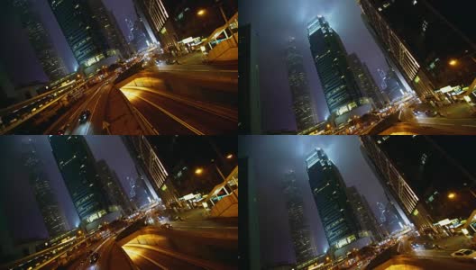 TU，香港夜晚的城市景观，中区快速的交通和摩天大楼高清在线视频素材下载