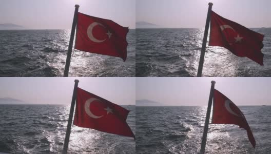 渡船上土耳其国旗慢镜头在船尾飘扬。高清在线视频素材下载