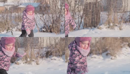 寒假，假期，游戏，家庭概念-中部计划正宗的幼稚园小女孩3-4岁在紫色的草地上走在下雪的乡间小路上。孩子在雪地上奔跑高清在线视频素材下载