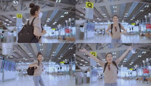 闭关已过，旅行时间到，幸福迷人的旅行者亚洲女性休闲布手挥手势微笑着走在航站楼机场愉快的微笑幸福安全的旅行理念高清在线视频素材下载