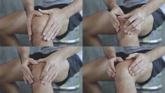 男人用疼痛按摩膝盖高清在线视频素材下载