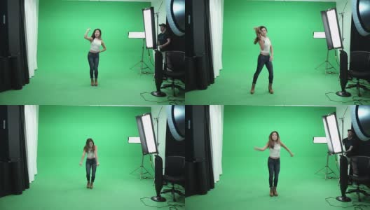 亚洲女孩在绿色背景上跳舞高清在线视频素材下载