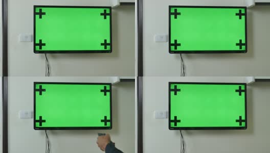 过肩镜头的绿色屏幕电视高清在线视频素材下载
