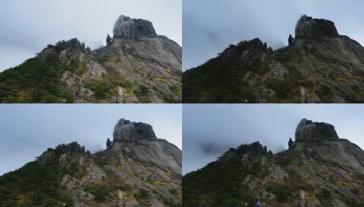 登山的游客在陡峭的山上高清在线视频素材下载