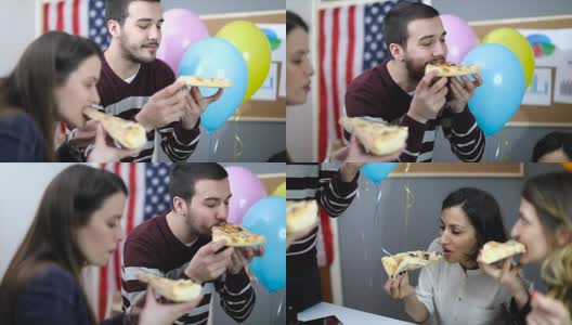 人们在生日派对上吃披萨高清在线视频素材下载