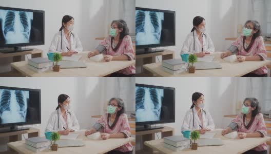 亚洲女医生通过家庭保健工作访问年长女性病人高清在线视频素材下载