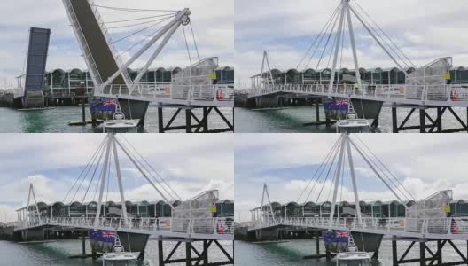 4K时间流逝:新西兰奥克兰市的大桥升起，船只经过。高清在线视频素材下载