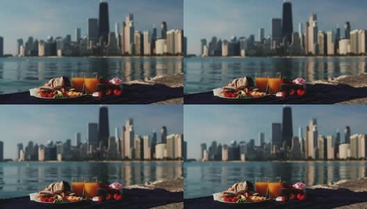 近距离观看水果和果汁在密歇根湖在芝加哥，美国在阳光明媚的一天高清在线视频素材下载