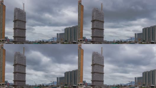 在香港这个大都市的背景下，建造摩天大楼时施工设备的操作高清在线视频素材下载